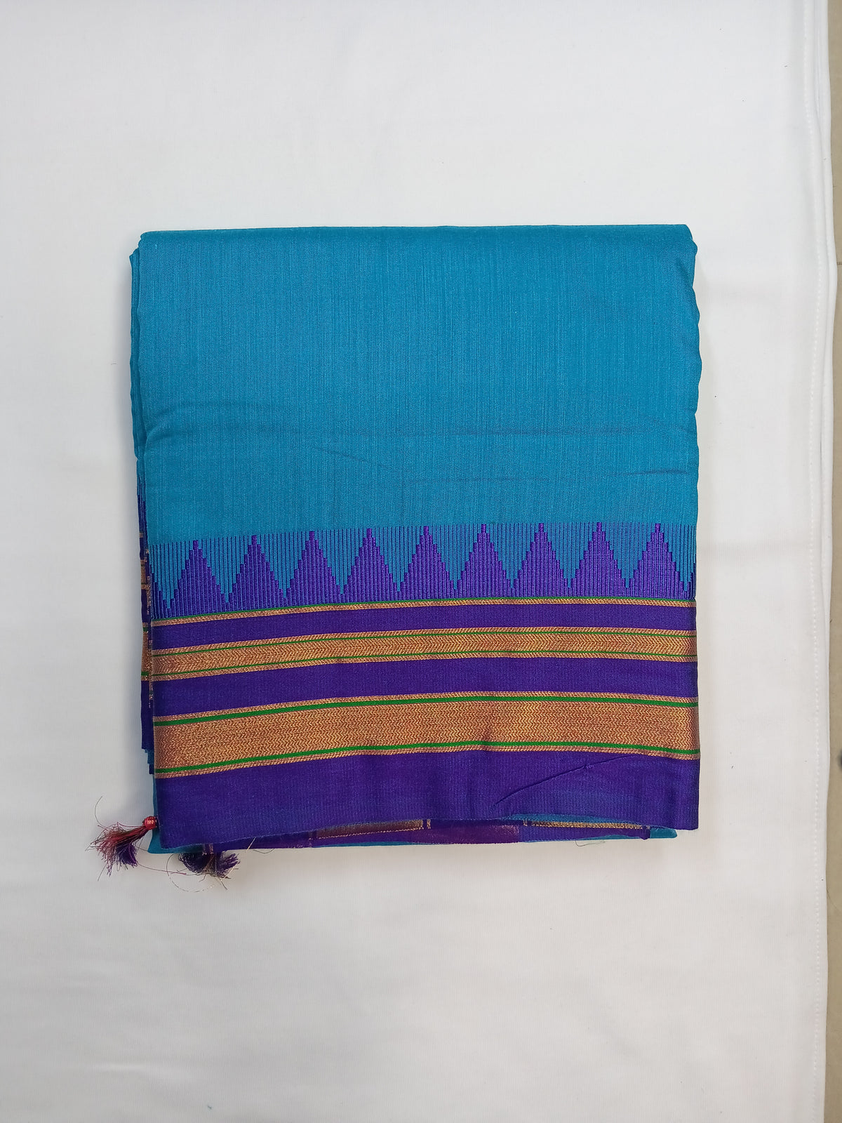 Turquoise Blue Ilkal Plain Saree with Purple Temple Border