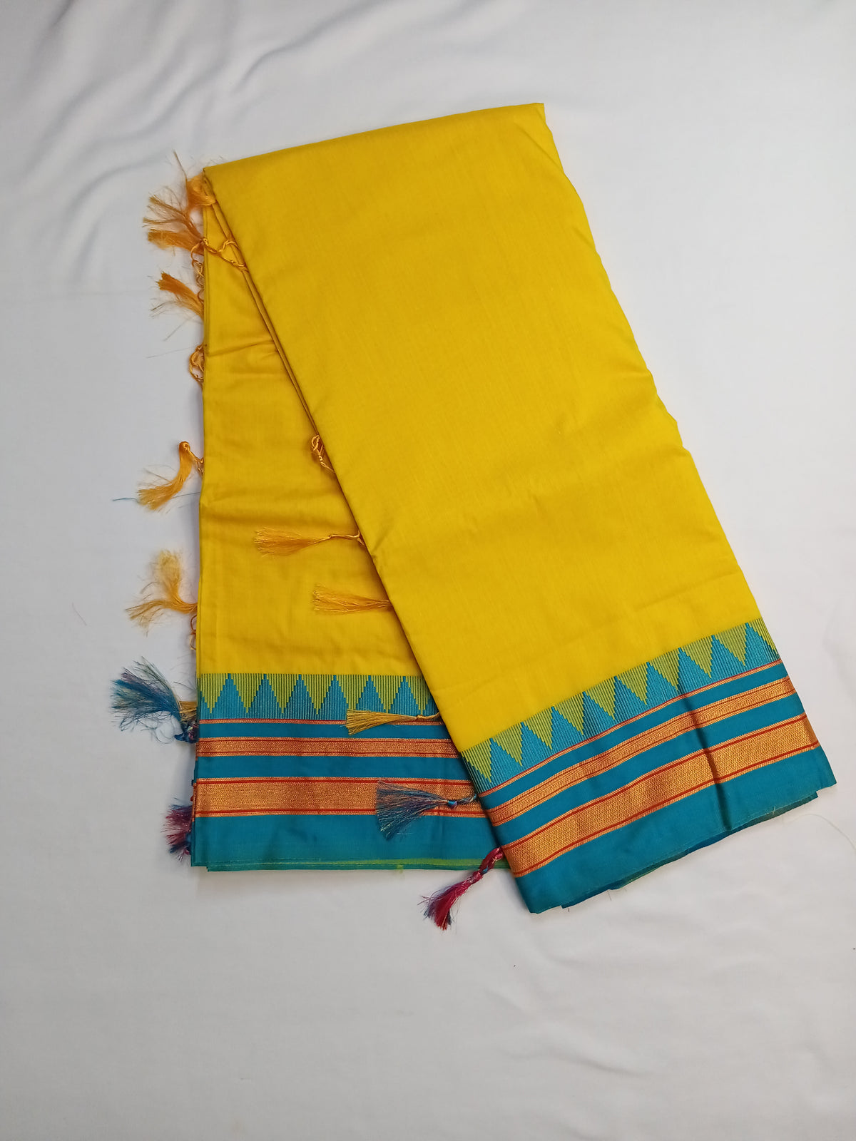 Mustard Yellow Ilkal Plain Saree with Teal Temple Border