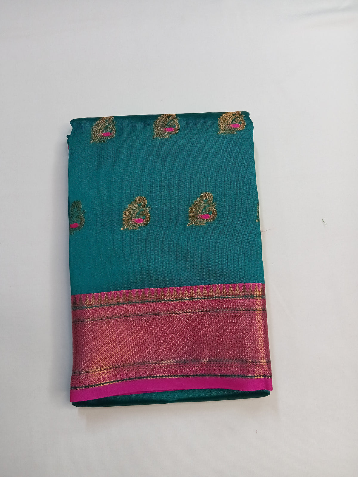 Teal Blue Peacock Silk Saree with Rich Contrast Border