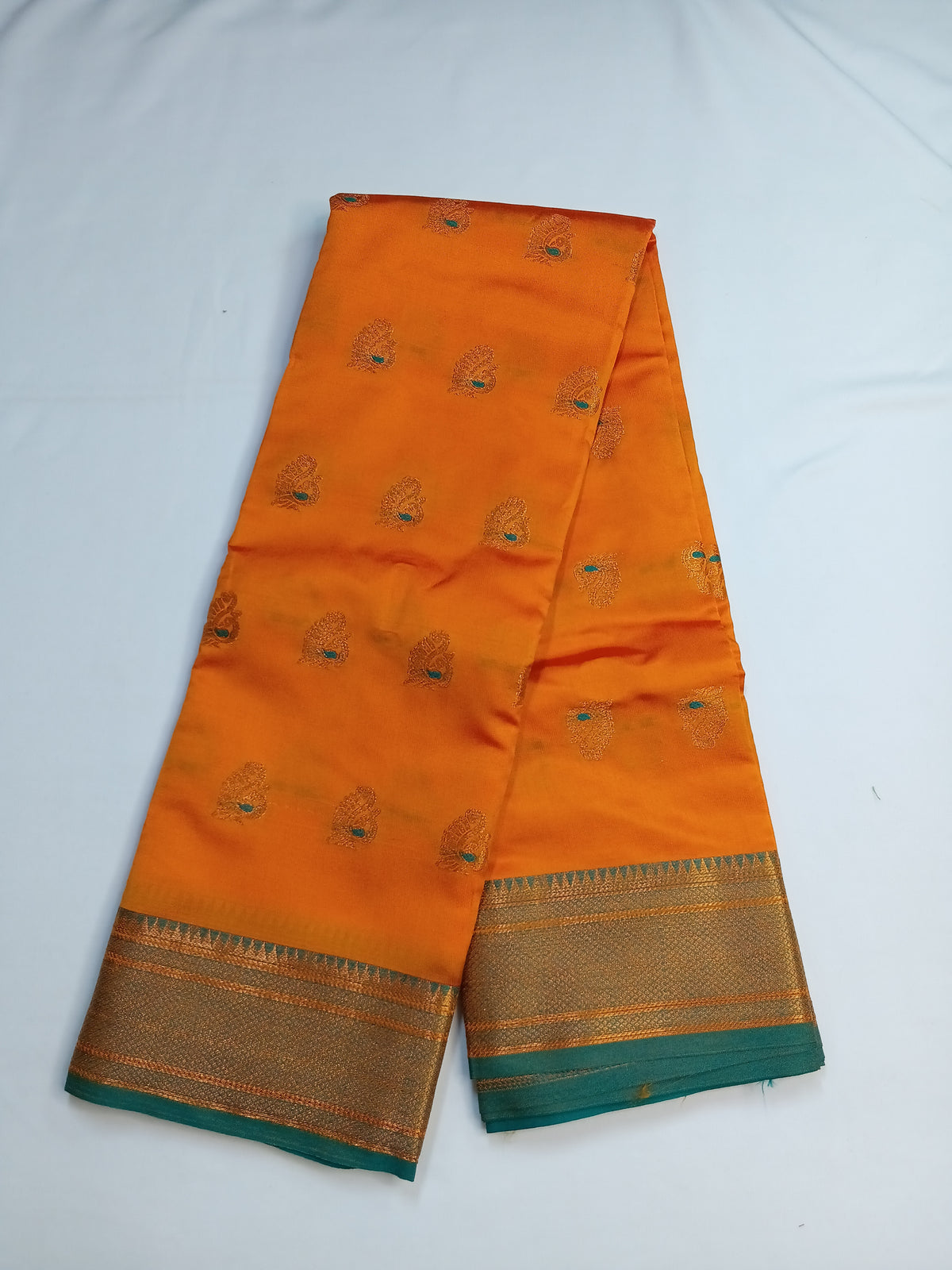 Mustard Orange Peacock Silk Saree with Rich Contrast Border
